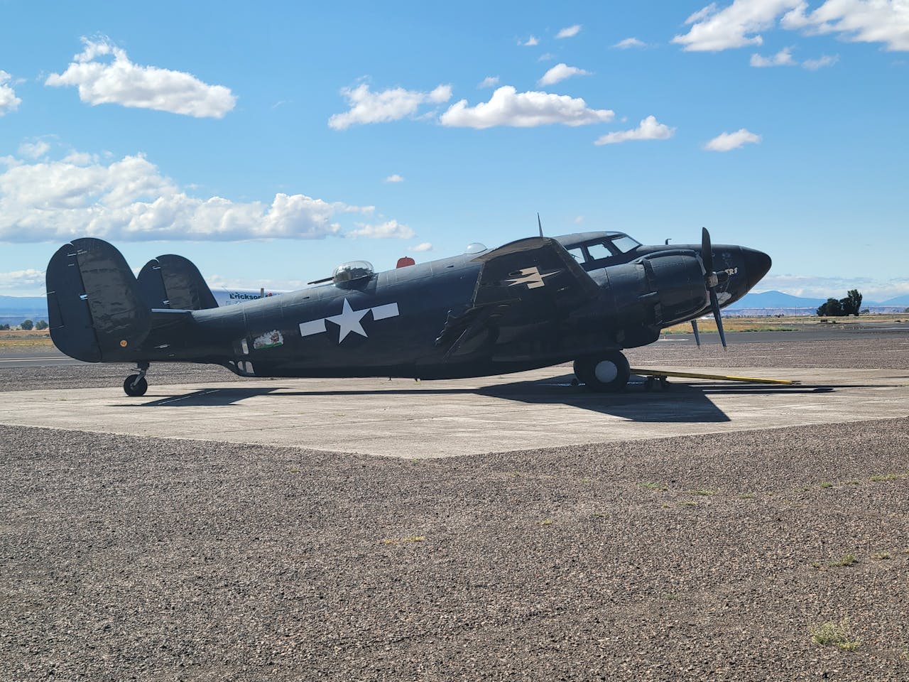 world-war-ii-era-military-aircraft-on-tarmac-34583491